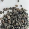 Partículas de material filtrante de roca volcánica para la filtración de agua de plantas de tratamiento de aguas residuales de roca volcánica para uso paisajístico en humedales construidos con jardines.