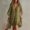 Roupas Femininas Europeias e Americanas de Verão 2026 Novo Vestido Feminino com Decote V Roupa de Praia para Férias Soltas Estampado de Leopardo Vestido de Praia