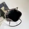 Bolsa de Mano Tote Lisa Color Sólido Estilo Coreano 2026 Otoño Nuevo Bolso de Hombro de Gran Capacidad Bolsa Versátil para Mujer Tendencia al por Mayor