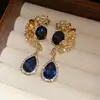 Brincos de Franja Flor de Strass Azul Europeus e Americanos Transfronteiriços Agulha de Prata, Brincos de Tarraxa Modernos e Requintados, Brincos de Luxo Leve de Alta Qualidade para Mulheres
