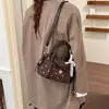2026 Bowling Simple Estilo Nuevo Viaje Versión Coreana Bolso de Nicho Bolso de Mano Bolso Cruzado Casual Versátil Lunares Mujer