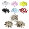 Al por mayor en stock Hebilla de cinco garras de 9.5 mm Botones infantiles huecos de colores + Herramienta de alicates de prensa manual Juego de botones a presión