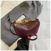 Bolso de mano de comercio exterior moderno y sofisticado para mujer, nuevo bolso de nicho retro de lujo ligero para teléfono móvil, bolso de hombro y bandolera