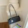 Bolso de axila de alta gama con textura elegante para mujer 2026 nuevo moderno de moda versátil bandolera simple bolso de mano casual