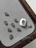 1000 piezas Plata Antigua Cruz Arte de Uñas Aleación Adornos Estilo Oscuro Punk Flor Decoración de Uñas Bolsa Completa Personalizado Venta al por Mayor