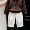 Ropa Infantil Coreana 2026 Otoño/Invierno Nuevo Estilo Color Café Cuello Polo Texturizado Suéter de Punto Pantalones Blancos de Pierna Recta para Niños Modernos