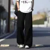 Pantalones largos casuales de seda helada de verano, marca de moda de alta calle americana, diseño recto suelto para jóvenes hombres, pantalones de pierna ancha