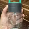 Nuevo Estilo Simple Al Por Mayor Estudiante Asa Portátil Lindo Gordito Botella de Agua de Vidrio Abre Regalo Botella de Agua Ligera