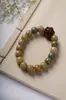 Material de semilla de jade de Hainan, jade blanco, raíz de Bodhi, leche amarilla, diseño original, pulsera DIY, bestia dorada, cuerda de loto tallada