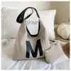 Bolsa Tote de Luxo Transfronteiriça 2026 Nova Coleção Primavera Vintage Grande Capacidade Moda Versátil Nicho Bolsa de Ombro de Mão