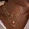 El nuevo conjunto de tres piezas de collar de 26 letras transfronterizo de Amazon es elegante, sofisticado y versátil con una cadena para la clavícula multicapa en forma de corazón.