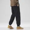Pantalones casuales tipo jogger negros para hombre, nuevo estilo 2026, holgados y versátiles, pantalones de moda para hombre, nuevos pantalones deportivos elegantes de otoño e invierno