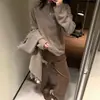 Nuevo suéter de punto de lana pura para mujer de otoño e invierno con bordes enrollados, cuello redondo, mangas largas, casual y amigable con la piel