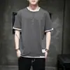 Camiseta de manga corta para hombre Verano 2022 Nueva para Adolescente Versátil Holgada Cuello redondo Falsa de dos piezas Camiseta de media manga Camisa base