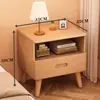 Mesita de noche de madera maciza para dormitorio del hogar 2026 Venta caliente Creativa Pequeño Armario de almacenamiento simple para niños Mesita de noche de tronco