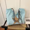 2026 Bolsa de Ombro Única de Lona Moda Sensação de Alto Padrão Bolsa Feminina Casual Versátil Bolsa de Estudante Tendência Grande Capacidade Bolsa Transversal Feminina