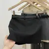 Saia curta estilo terno cinza para primavera e verão para mulheres, uma peça moderna e estilosa que acentua os braços, perfeita para baixinhas, com cintura alta e um efeito emagrecedor, criando uma silhueta elegante em A