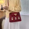 Bolsa feminina estilo luxo, novo modelo outono 2026, bolsa pequena tipo casa color block, bolsa de ombro e transversal moderna e única