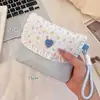 Bolsa de armazenamento de absorventes fofa e portátil, bolsa dobrável de grande capacidade para o período, bolsa de armazenamento de algodão para estudantes e meninas