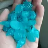 Piedras pequeñas que brillan en la oscuridad del océano, conchas de caracola luminosas de animales marinos, paisajismo de acuarios, grava fluorescente para el fondo de acuarios transfronterizos
