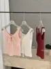Wgwe8575 Guangzhou Shisanxing Blusa Regata Feminina Nova Coleção Primavera/Verão com Cadarço Vazado Tecido Texturizado Tendência