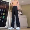 Pantalones de vestir rectos negros con caída de alta gama, Pantalones ligeramente acampanados de seda helada para hombre, Pantalones casuales de traje para exportación de primavera