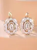 Brincos Oval Zircônia Super Brilhantes Ouro Rosa Mais Vendidos Transfronteiriços, Clipe de Orelha Elegante de Design de Nicho de Luxo Leve para Mulheres