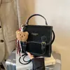 Mochila Retro Transfronteriza de Moda para Mujer 2025 Nueva Tendencia Versátil Bolso de Mano Estudiante Clase Casual Bolso de Mujer
