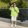 Camiseta Ligera Transpirable de Algodón Puro Coca-Cola para Niños 2026 Verano Nuevo Diseño de Panda para Niños Mayores Estilo Coreano Versátil Moderna Camiseta