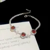 Pulsera de flor redonda con cierre de circonita, lujo ligero, alta gama, pulsera exquisita con un diseño elegante, versátil y a la moda, venta al por mayor