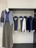 Cárdigan de punto patchwork de mezclilla con solapa para mujer, nuevo estilo primavera/otoño 2026, top de imitación de dos piezas, chaqueta suéter holgada y elegante