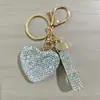 Llavero de corazón de diamantes completos colgante para llave de coche etiqueta de moda se puede abrir llavero de amor