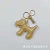 Colgante de Bolsa de Cachorro de Dibujos Animados Colgante Creativo para Llavero de Coche Parche para Funda de Teléfono Móvil de Cachorro Grande Colgante para Pulsera de Muñeca