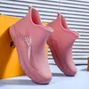 Botas de lluvia de suela gruesa para mujer, impermeables, antideslizantes y duraderas; botines de lluvia cortos de suela gruesa para hombre a la moda; zapatos de trabajo para cocina