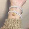 Pulsera de cascabeles antigua de verano círculo de perlas pulsera de flor pequeña un par de amigas paso a paso joyería de mano fabricantes al por mayor