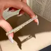 Pulseira com pingente de estrela quadrada de zircônia cúbica europeia e americana, apresentando um design retrô e minimalista, uma pulseira única e elegante com um toque de luxo e sofisticação