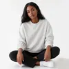 Sudadera redonda de moda estilo ins europeo y americano, unisex, corte holgado, jersey versátil, color liso, camiseta de manga larga de comercio exterior, a la moda para usar como prenda exterior