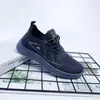 Primavera 2026 Novo Tênis Casual Masculino Flyknit Leve Confortável Solado Inflável Tênis Esportivo Masculino Resistente ao Desgaste Tênis Masculino de Tecido Flyknit