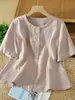 Nuevo top de camisa de algodón y lino de manga corta con cuello redondo y un solo botón, versátil para el verano, ropa casual para mujer, adelgazante y versátil
