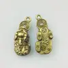 Pixiu mordiendo monedas de cobre, pieza única, accesorio de latón de imitación, llavero, colgante, decoración, llavero de Pixiu para atraer riqueza, al por mayor
