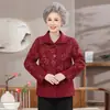 Elegante abrigo retro de flores azul oscuro talla extra para mujeres de mediana edad y mayores, combinado con un bolso exquisito para primavera y otoño.