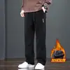 Pantalones para hombre transfronterizos cintura elástica pierna cónica pantalones modernos para hombre estilo casual color liso a rayas pana pantalones largos modernos