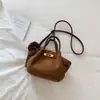 Bolsa bucket moderna e estilosa, nova coleção outono 2026, design minimalista e retrô, bolsa transversal única, despojada e versátil para o dia a dia, bolsa de mão