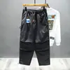 Marca de moda de otoño e invierno Pantalones casuales pesados americanos Pantalones tipo harén para hombre Cintura elástica Calle alta Sueltos Rectos Pantalones casuales para hombre