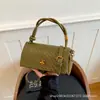 A bolsa pequena de trama popular deste ano para mulheres 2026 nova bolsa transversal versátil elegante bolsa de mão para o trabalho bolsa de ombro bolsa quadrada pequena
