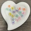 Ding Yi cuentas de flores pequeñas cuentas centrales Baño de luna fría Artículos de alta calidad sin rayones agujero recto agujero pasante cuentas accesorios para cadena de teléfono móvil diy collar