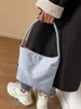 Bolsa de tela de nailon portátil estilo coreano para mujer Verano 2023 Nueva llegada de moda Bordada Bolso de axila Bolso cubo de un hombro todo a juego