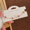 Pulseira Flor de Trevo de Quatro Folhas com Microincrustação de Madrepérola Doce e Estilosa, Pulseira Popular Tendência de Luxo Leve com Ajuste Deslizante para Mulheres