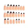 Item de venda quente do comércio exterior 24 peças nail art delicado estilo pequeno Chanel preto e branco bolinhas flores francesas amêndoa curta unhas postiças atacado