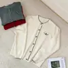 Cárdigan de punto con bloques de color estilo tweed color mapache para mujer, nueva colección otoño/invierno 2026, suéter de manga larga con bolsillos falsos